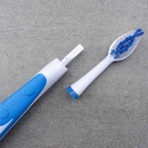 replace battery in quip toothbrush