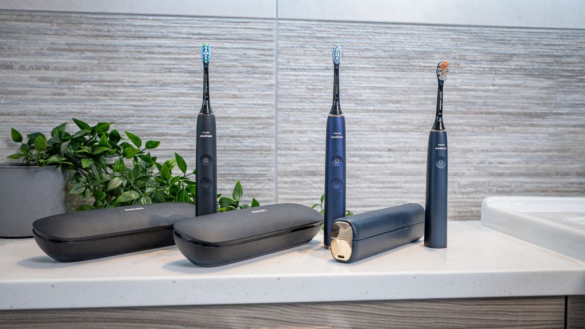 3 Sonicare toothbrushes with premium charging travel cases