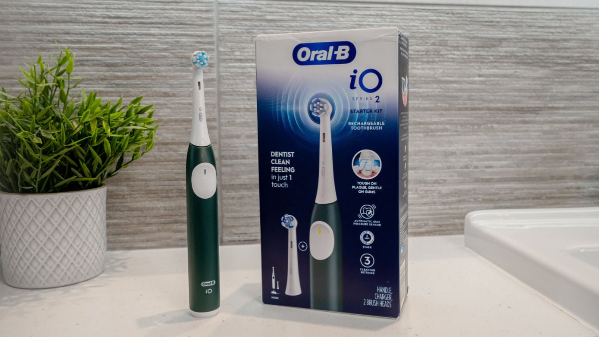 Oral-B iO2 stood upright next to its box