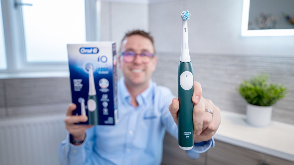 Jon holding the Oral-B iO2 to camera